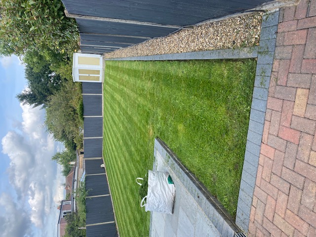 Striped lawn and gravel border